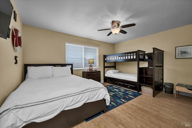 13201 Keys Blvd, Clearlake Oaks, CA 95423 - bedroom with wood finished floors and a ceiling fan