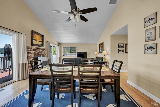 13201 Keys Blvd, Clearlake Oaks, CA 95423 - dining space featuring light wood-type flooring, baseboards, ceiling fan, and high vaulted ceiling