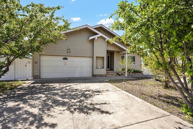 13201 Keys Blvd, Clearlake Oaks, CA 95423 - view of front of house featuring driveway and an attached garage