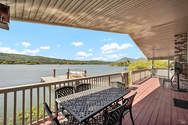 13201 Keys Blvd, Clearlake Oaks, CA 95423 - deck featuring outdoor dining space, a water view, and a boat dock