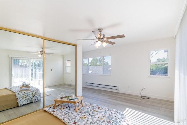 7 Fairview Ave, Vallejo, CA 94590 - living room with baseboard heating, a ceiling fan, and plenty of natural light