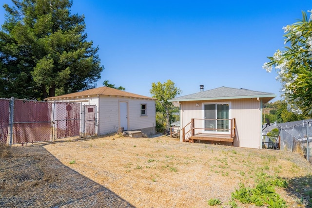 7 Fairview Ave, Vallejo, CA 94590 - rear view of house with a gate and an outdoor structure
