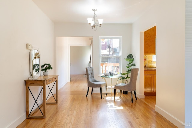 7 Fairview Ave, Vallejo, CA 94590 - sitting room featuring a chandelier, light wood-style floors, and baseboards