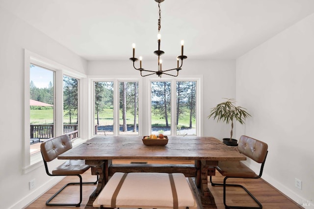 9 Spring Meadows Rd, Mccloud, CA 96507 - dining space with a chandelier, baseboards, and wood finished floors