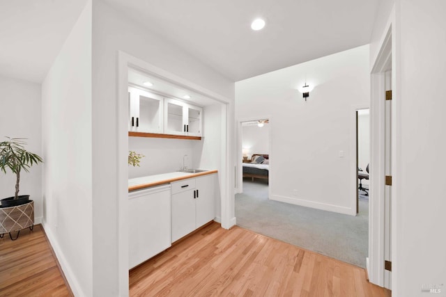 9 Spring Meadows Rd, Mccloud, CA 96507 - indoor wet bar featuring light wood-style floors, recessed lighting, baseboards, and dishwasher