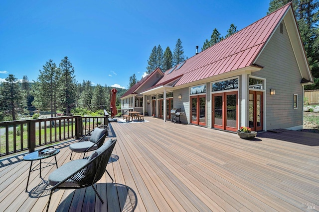 9 Spring Meadows Rd, Mccloud, CA 96507 - wooden deck with outdoor dining space and a grill
