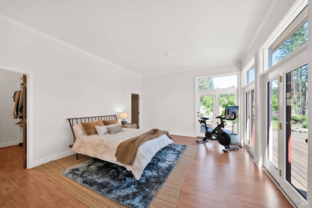 9 Spring Meadows Rd, Mccloud, CA 96507 - bedroom with access to outside, baseboards, wood finished floors, and crown molding