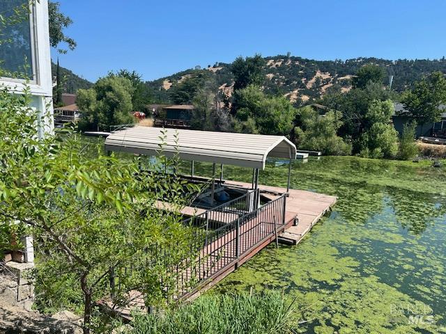13238 Ebbtide Vlg, Clearlake Oaks, CA 95423 - dock featuring a water and mountain view