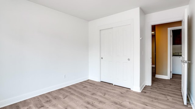 9149 Windsor Rd, Windsor, CA 95492 - unfurnished bedroom with light wood finished floors and a closet