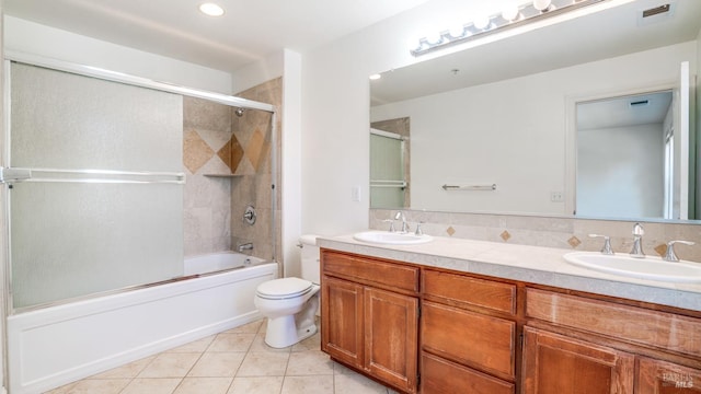 9149 Windsor Rd, Windsor, CA 95492 - bathroom with double vanity, tile patterned flooring, enclosed tub / shower combo, and recessed lighting