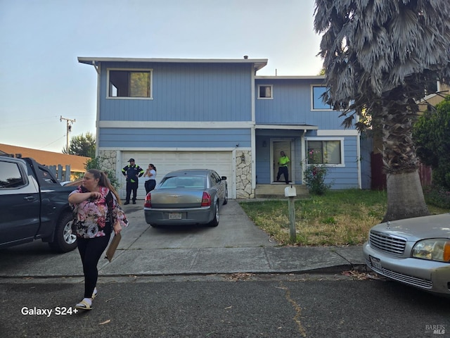 3 Greenfield Ct, Vallejo, CA 94590 - traditional-style house with stone siding, a garage, and driveway