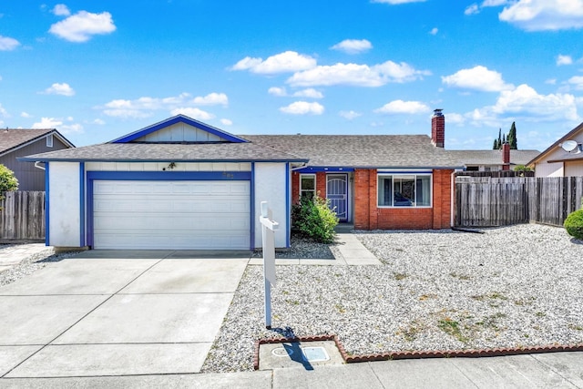 201 Pamela Ct, Vallejo, CA 94589 - ranch-style home with concrete driveway, a chimney, a garage, a shingled roof, and brick siding