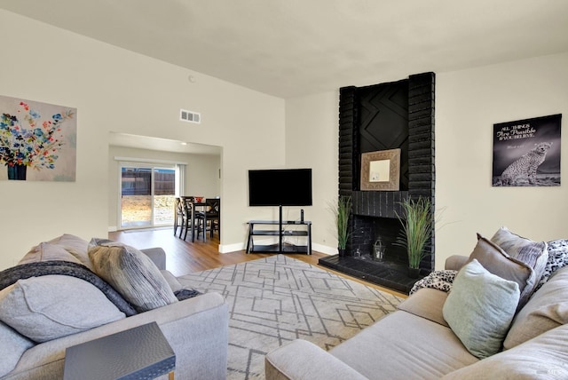 201 Pamela Ct, Vallejo, CA 94589 - living room featuring wood finished floors, a fireplace, and baseboards