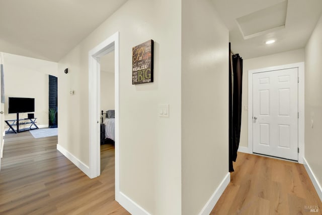 201 Pamela Ct, Vallejo, CA 94589 - corridor with light wood-style floors, baseboards, and attic access