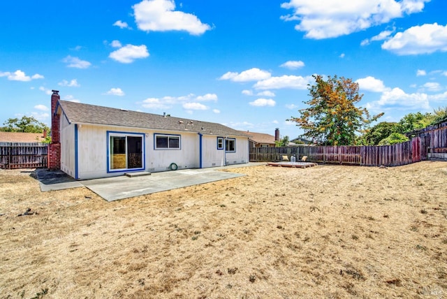 201 Pamela Ct, Vallejo, CA 94589 - rear view of property featuring a patio, a chimney, and a fenced backyard