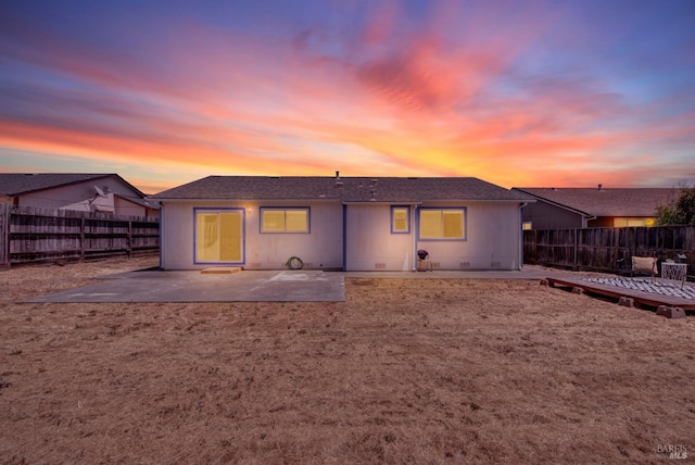201 Pamela Ct, Vallejo, CA 94589 - back of property at dusk with a patio and a fenced backyard