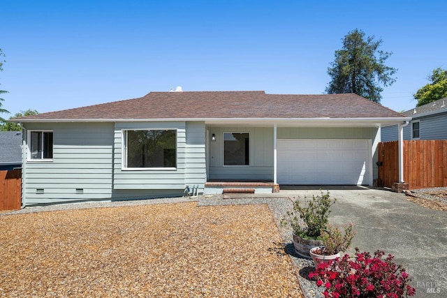 1408 Carl Ave, Vallejo, CA 94590 - ranch-style home with asphalt driveway, an attached garage, a porch, a shingled roof, and board and batten siding