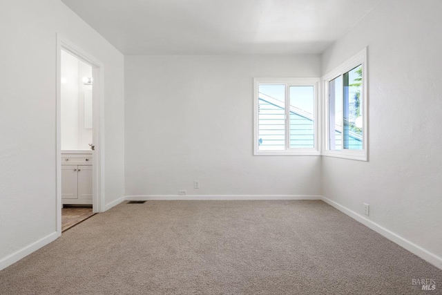 1408 Carl Ave, Vallejo, CA 94590 - unfurnished bedroom featuring carpet, baseboards, and ensuite bathroom
