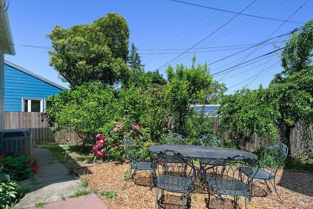 1408 Carl Ave, Vallejo, CA 94590 - fenced backyard featuring outdoor dining space and cooling unit