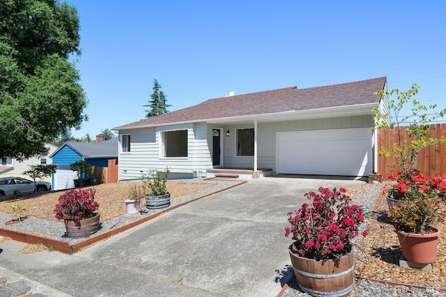 1408 Carl Ave, Vallejo, CA 94590 - single story home with driveway, a garage, and roof with shingles