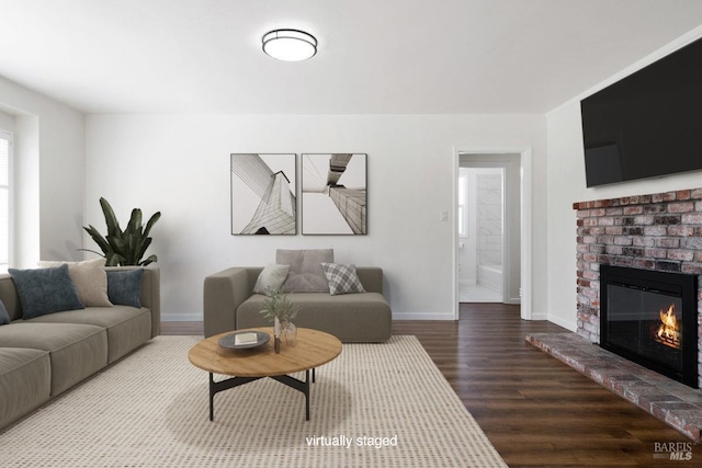 1408 Carl Ave, Vallejo, CA 94590 - living room featuring wood finished floors, baseboards, and a brick fireplace