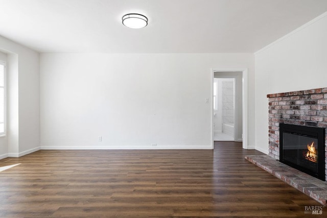 1408 Carl Ave, Vallejo, CA 94590 - unfurnished living room featuring a fireplace, dark wood-type flooring, and baseboards