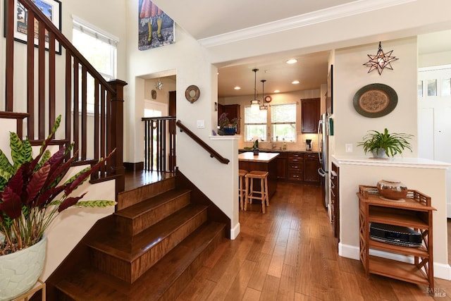 1617 Pear Tree Ln, Napa, CA 94558 - stairway featuring hardwood / wood-style flooring, ornamental molding, baseboards, and recessed lighting