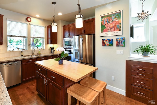 1617 Pear Tree Ln, Napa, CA 94558 - kitchen featuring stainless steel appliances, a sink, wood counters, dark wood finished floors, and recessed lighting
