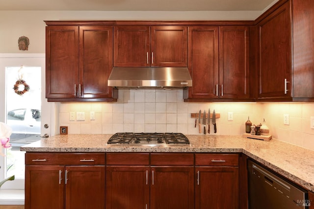 1617 Pear Tree Ln, Napa, CA 94558 - kitchen with under cabinet range hood, dishwashing machine, stainless steel gas stovetop, tasteful backsplash, and light stone counters