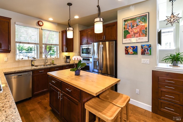 1617 Pear Tree Ln, Napa, CA 94558 - kitchen with a sink, appliances with stainless steel finishes, wood counters, dark wood finished floors, and decorative backsplash