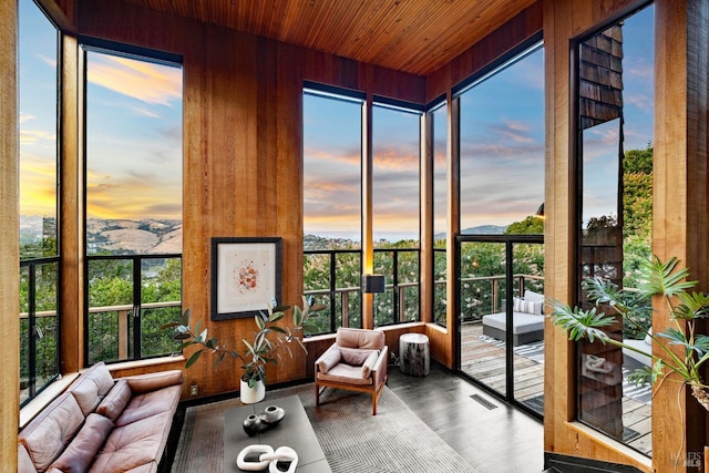 11 Crest Rd, Belvedere, CA 94920 - sunroom / solarium with wood walls, expansive windows, wood ceiling, and wood finished floors