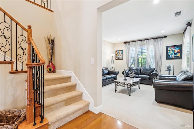 428 Lloyd Ct, Benicia, CA 94510 - living area featuring wood finished floors, stairs, baseboards, and recessed lighting