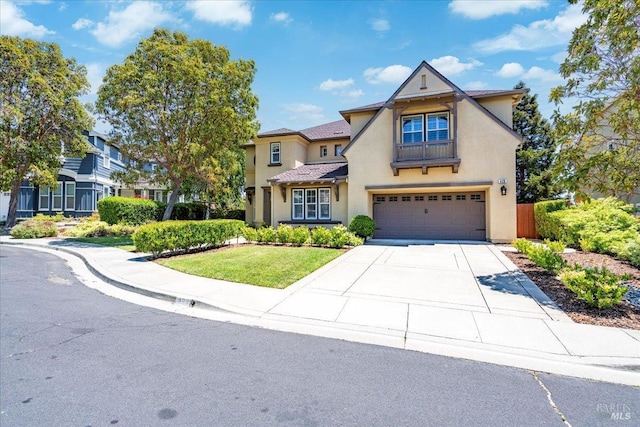 428 Lloyd Ct, Benicia, CA 94510 - view of front facade featuring an attached garage, stucco siding, concrete driveway, and a front yard