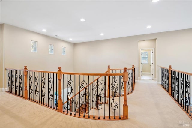 428 Lloyd Ct, Benicia, CA 94510 - hallway with an upstairs landing, carpet floors, recessed lighting, and baseboards