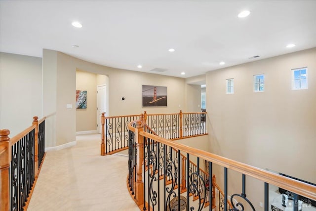 428 Lloyd Ct, Benicia, CA 94510 - corridor featuring an upstairs landing, recessed lighting, light carpet, and baseboards