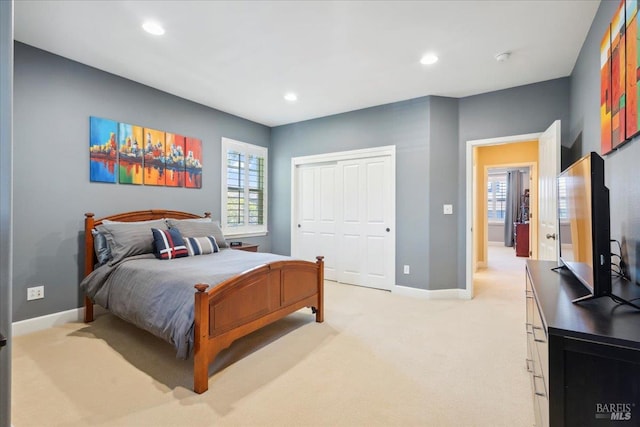 428 Lloyd Ct, Benicia, CA 94510 - bedroom featuring light carpet, baseboards, recessed lighting, and a closet