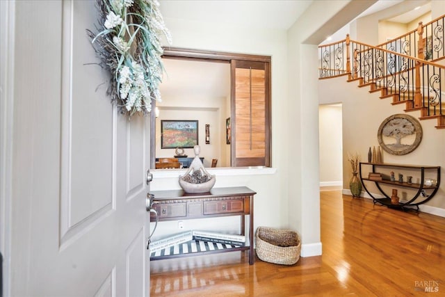 428 Lloyd Ct, Benicia, CA 94510 - entryway featuring wood finished floors, stairway, and baseboards