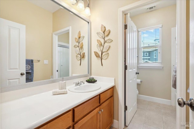 428 Lloyd Ct, Benicia, CA 94510 - bathroom with vanity, tile patterned flooring, toilet, and baseboards