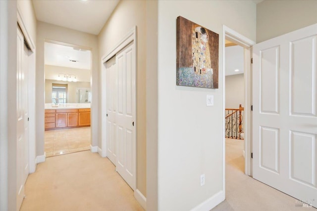 428 Lloyd Ct, Benicia, CA 94510 - corridor featuring light carpet, an upstairs landing, and baseboards