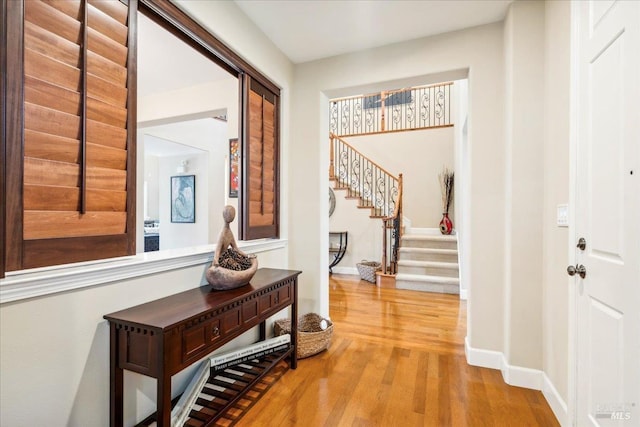 428 Lloyd Ct, Benicia, CA 94510 - foyer featuring stairway, light wood finished floors, and baseboards