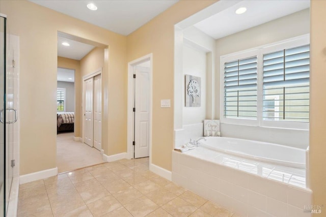 428 Lloyd Ct, Benicia, CA 94510 - ensuite bathroom with a garden tub, tile patterned floors, recessed lighting, a stall shower, and baseboards