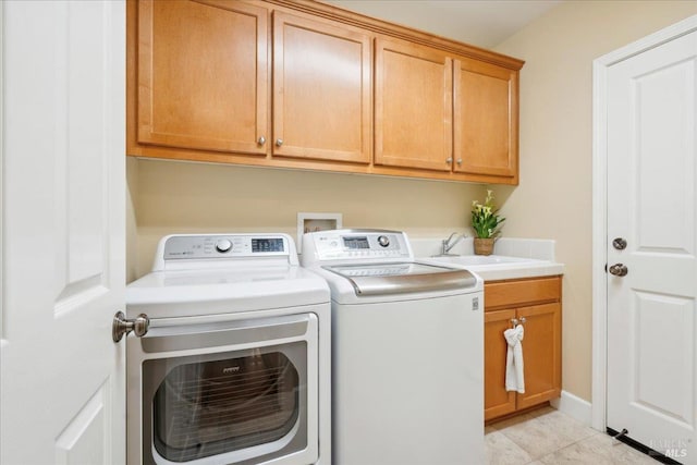 428 Lloyd Ct, Benicia, CA 94510 - washroom with washing machine and clothes dryer, cabinet space, and light tile patterned floors