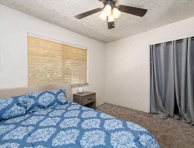 103 Quail Ct, Winters, CA 95694 - carpeted bedroom featuring a textured ceiling and ceiling fan