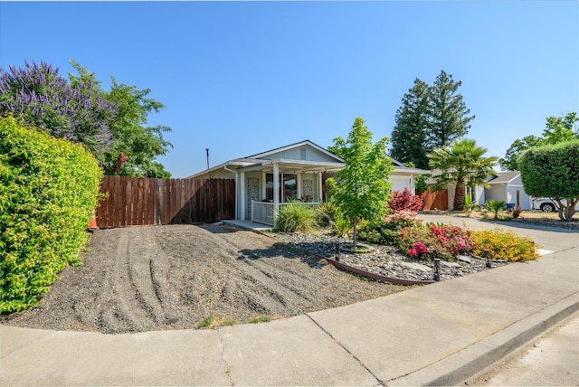 103 Quail Ct, Winters, CA 95694 - view of front of property featuring covered porch and concrete driveway