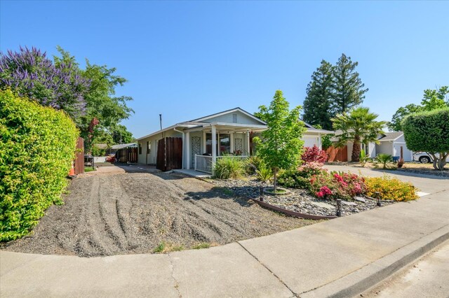 103 Quail Ct, Winters, CA 95694 - view of front facade featuring a porch and driveway