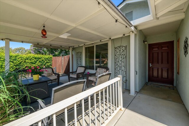 103 Quail Ct, Winters, CA 95694 - entrance to property with an outdoor hangout area and stucco siding