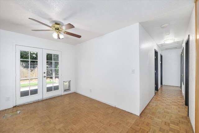 103 Quail Ct, Winters, CA 95694 - spare room with attic access, french doors, ceiling fan, and a smoke detector
