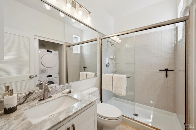 100 Lucky Dr Unit 109, Corte Madera, CA 94925 - full bathroom with stacked washer and clothes dryer, toilet, vanity, and a shower stall