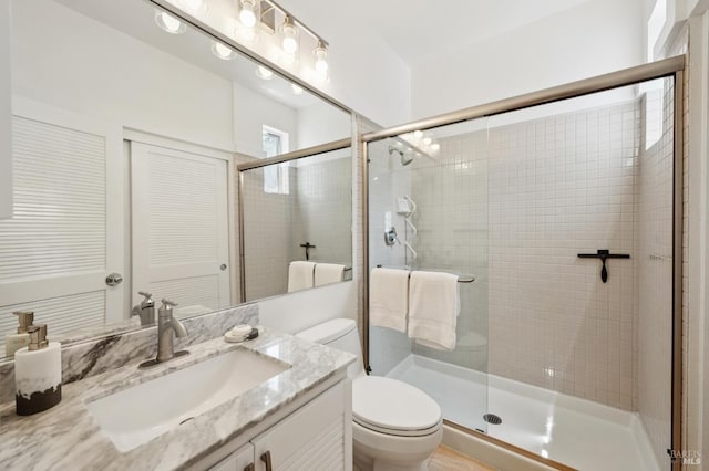 100 Lucky Dr Unit 109, Corte Madera, CA 94925 - bathroom with toilet, vanity, and a stall shower
