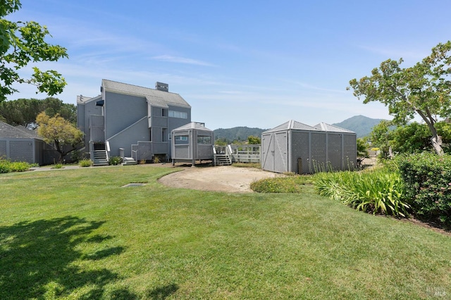 100 Lucky Dr Unit 109, Corte Madera, CA 94925 - view of yard featuring an outbuilding and a deck with mountain view